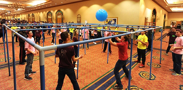 Area Catholic teens play a rousing game of Nine High. (Dan Cappellazzo/Staff Photographer)